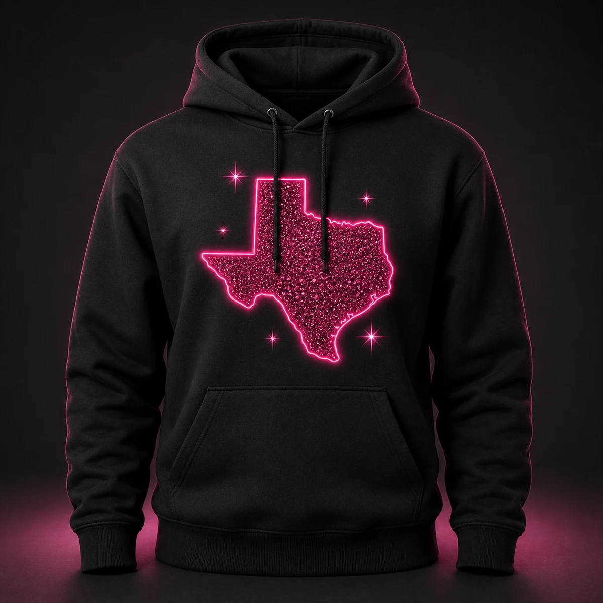 Black hoodie with a sparkling hot-pink Texas graphic concept mockup.